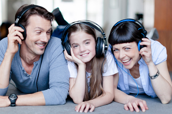 Family listening to music parents