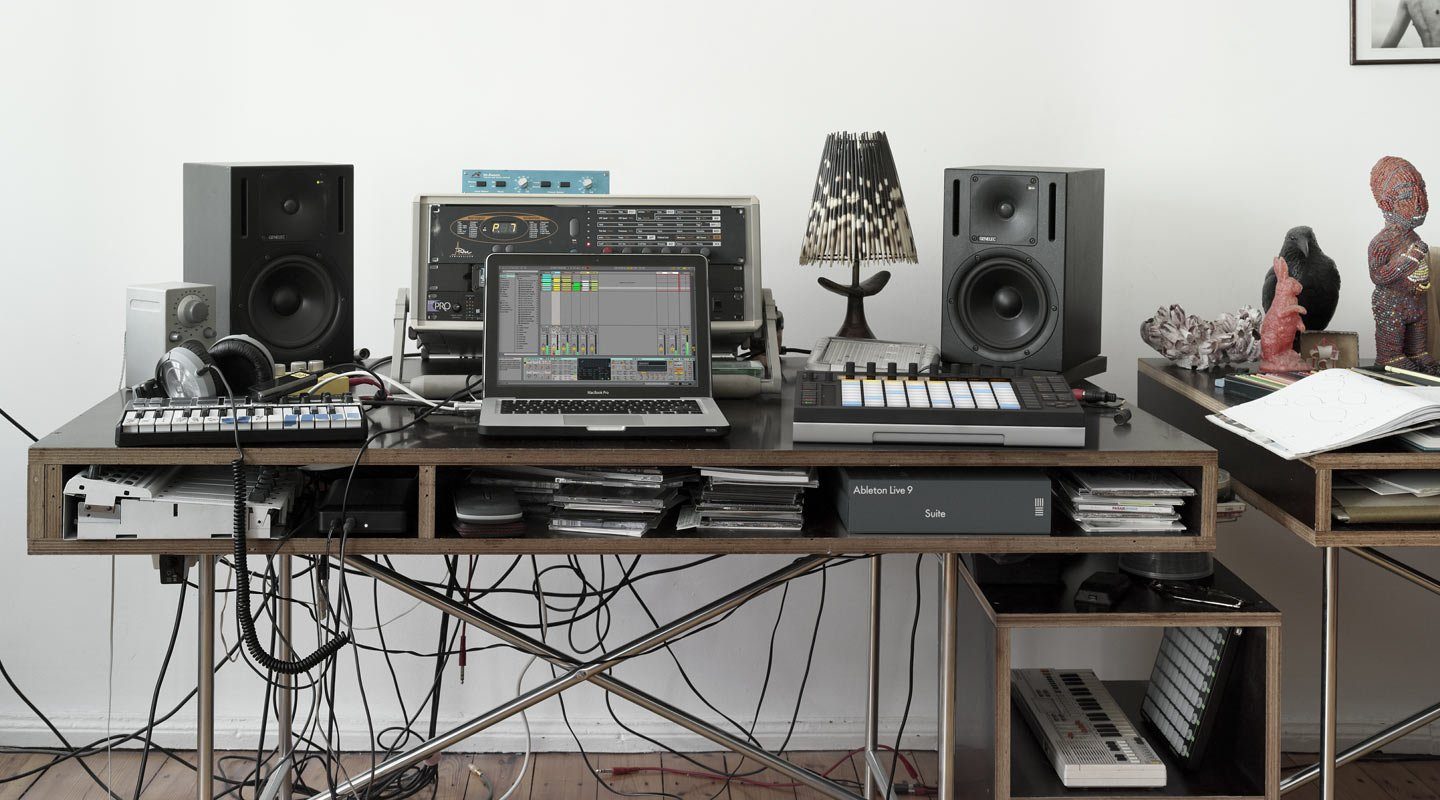 dj and computer equipment on a desk