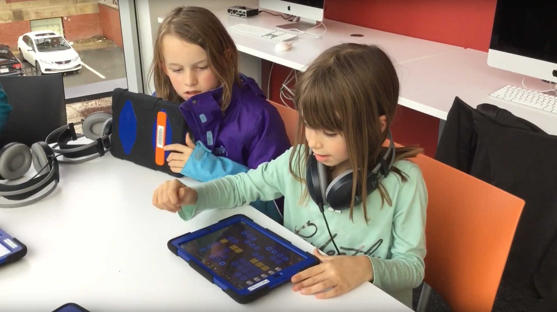 Kids making dance music on tablets at the Halifax Central Library