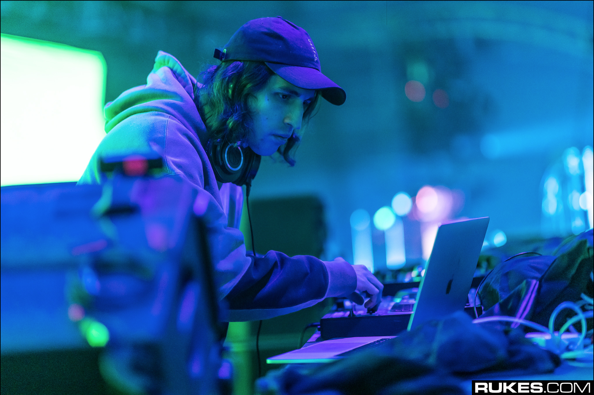 A close up of Porter Robinson as he performs at Decadence 2018