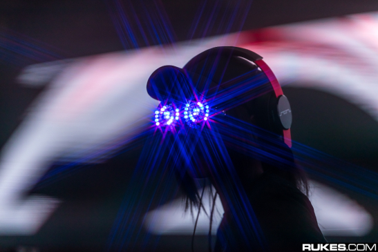 Rezz performs at Decadence 2018 with light up goggles on