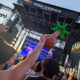 The main stage at Above & Beyond Weekender at The Gorge a girl with a blow-up palm tree