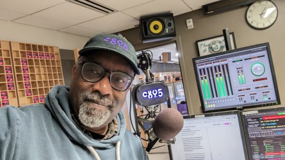 C89.5 Program Director Ron Chatman inside the radio studio
