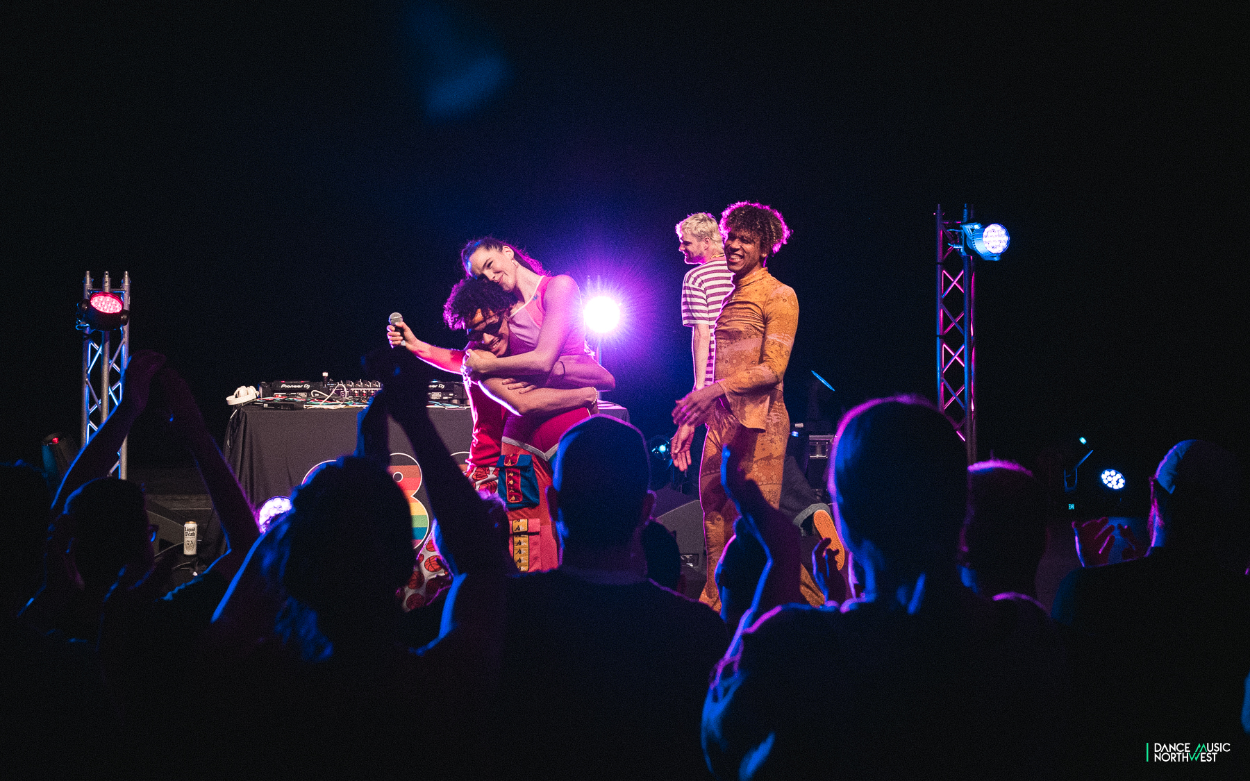 Sophie hugs her backup dancers during the Sofi Tukker show at Nathan Hale's Auditorium