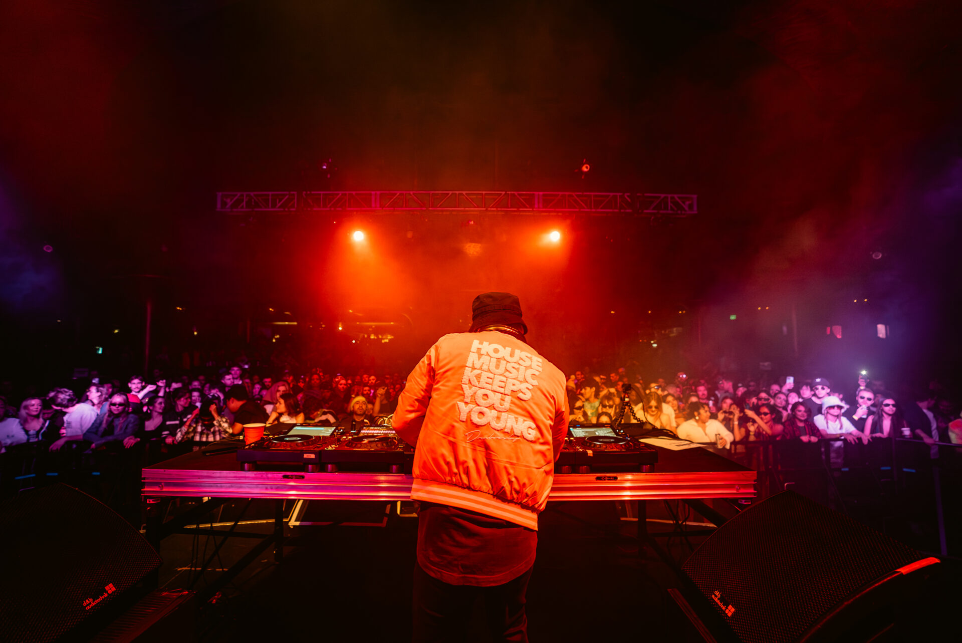 Dombresky performing at Showbox. Jacket reads: House Music Keeps You Young