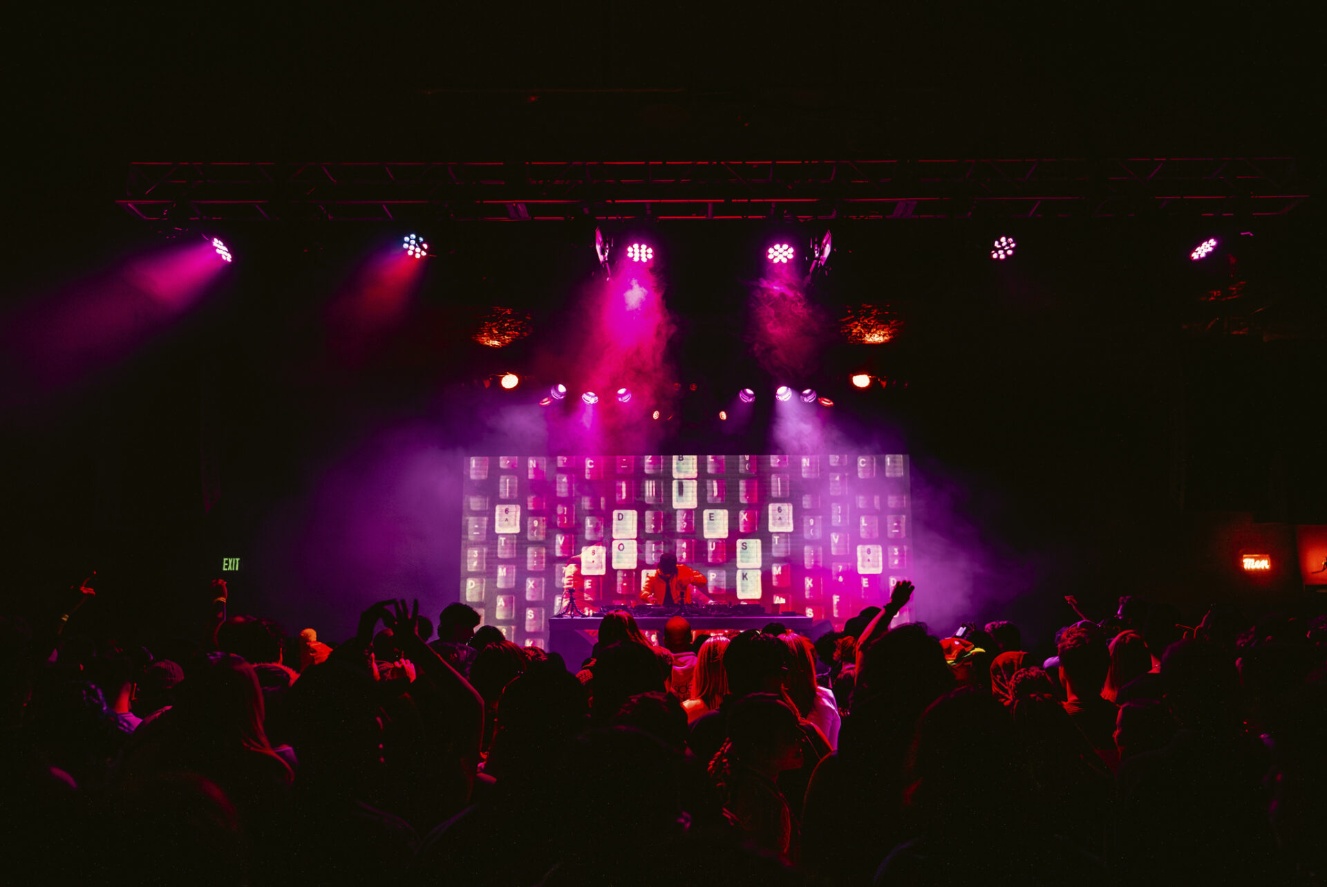 Dombresky playing at the showbox with red and pink lights