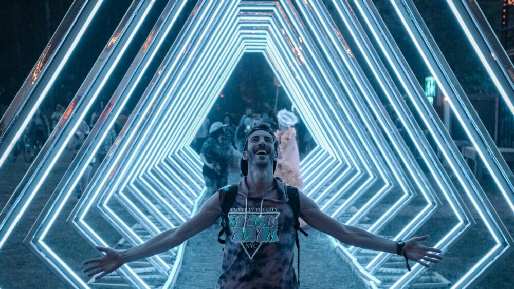 People walk through an art installation at Bass Coast Music Festival.