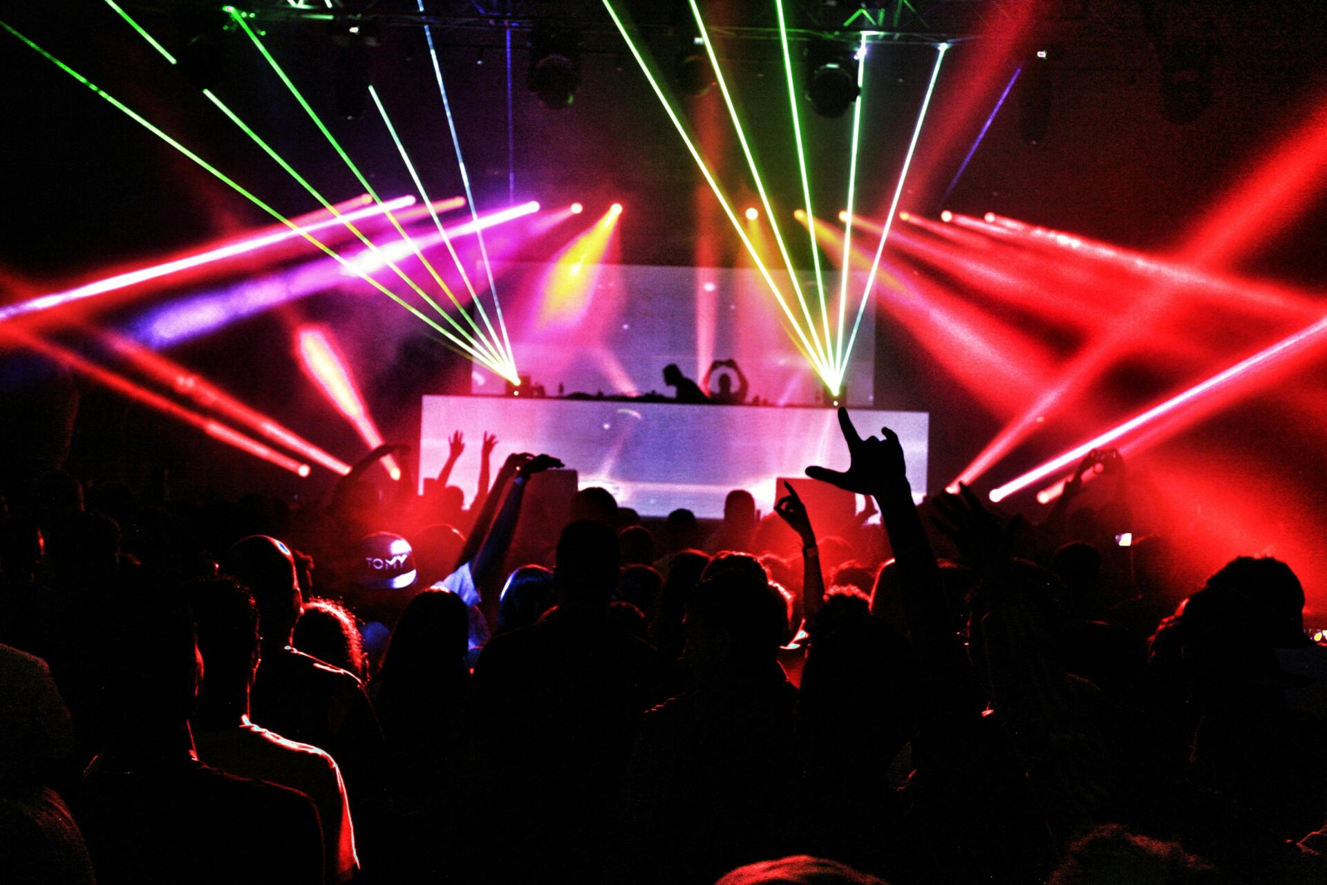 The Bright Side of Rave Culture: Exploring Its Mental Health Benefits 13 Crowd with stage and lasers