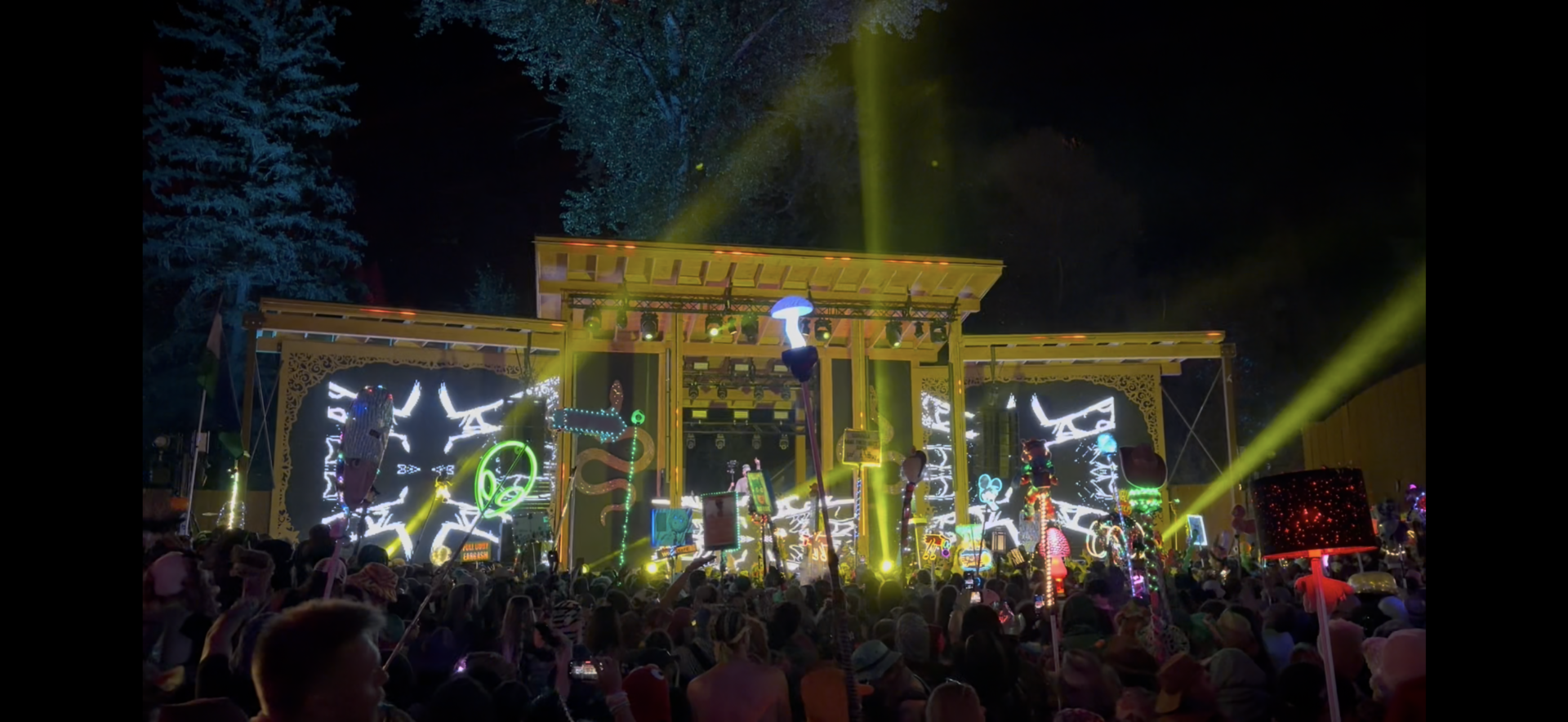 Jykl and Hyde performing at the AMP stage with lasers and visuals